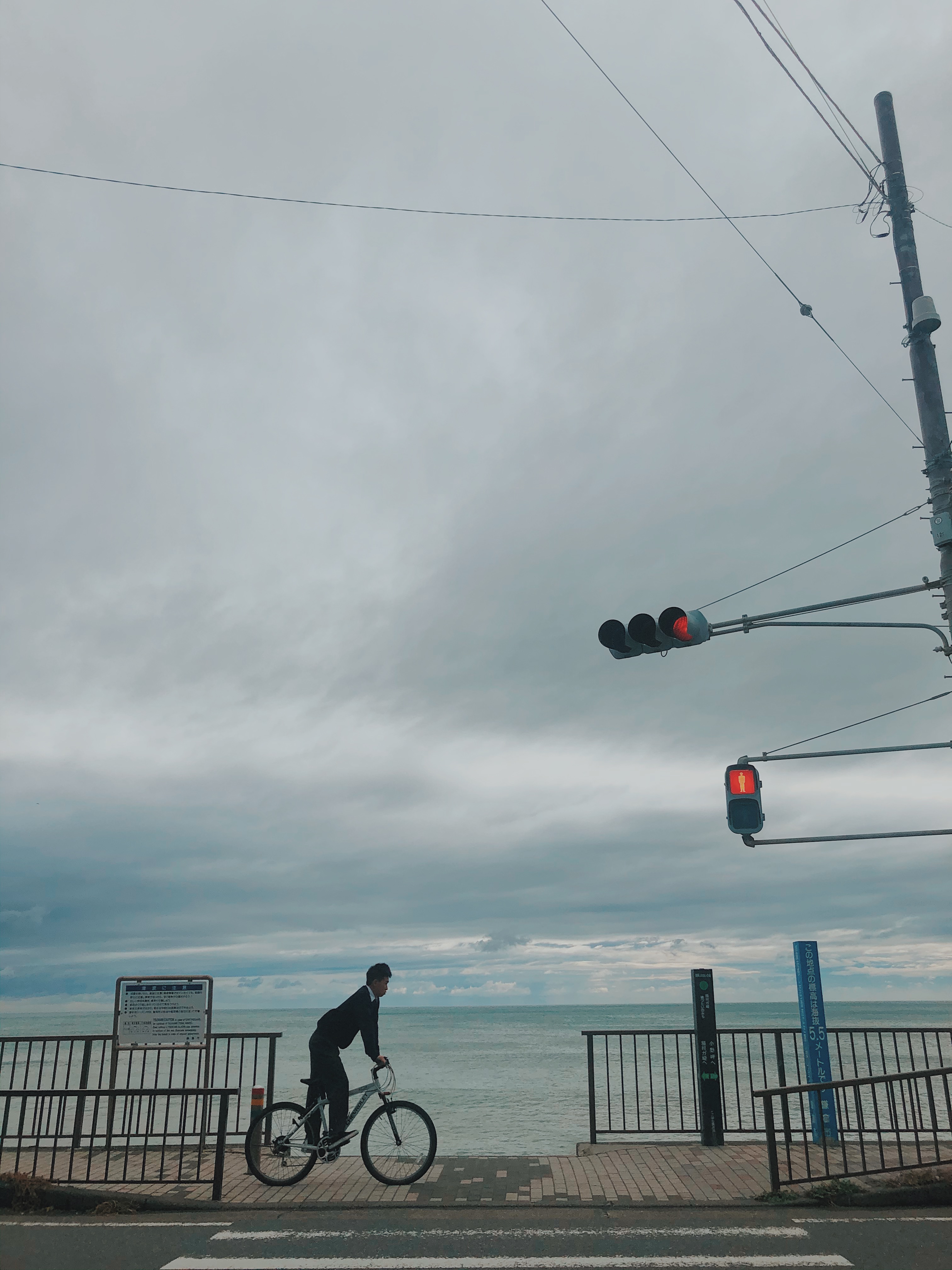 A man riding a bike.